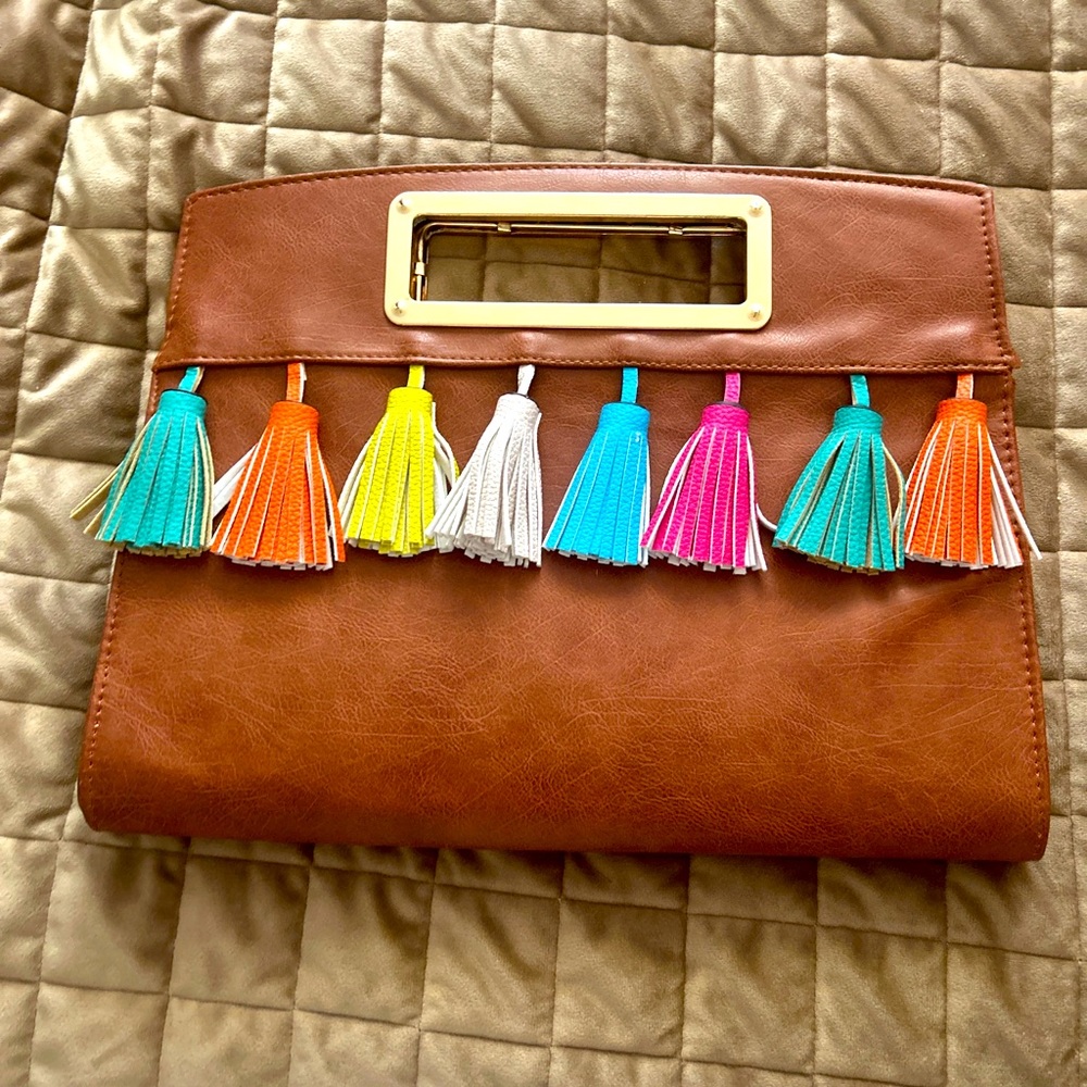 Brown leather bag with colorful tassels